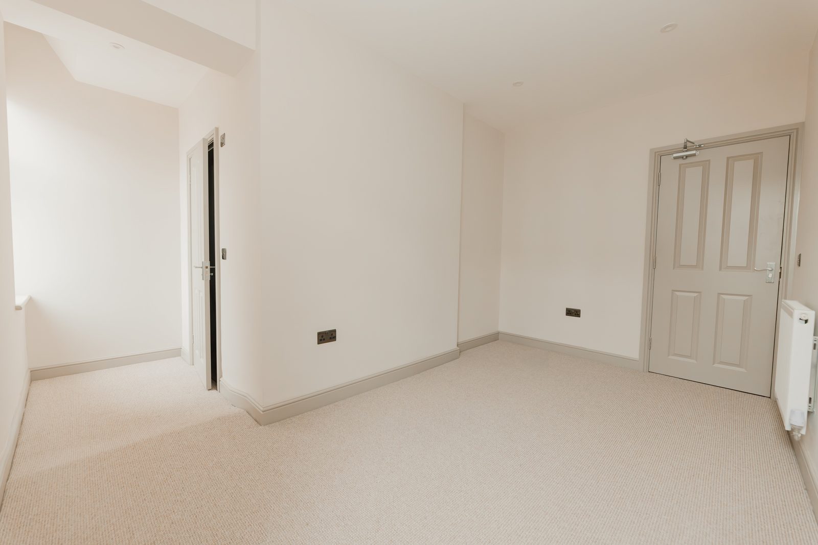 Spacious resident room with period proportions and full carpeting